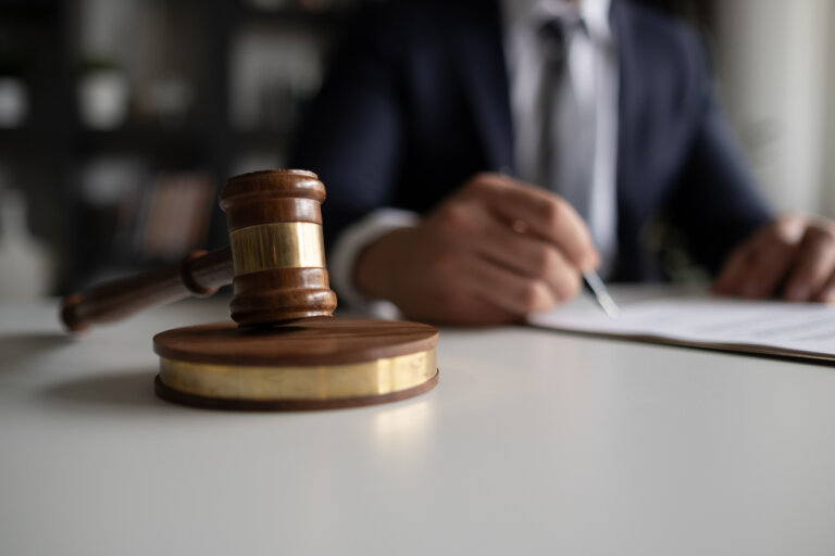 Lawyer with a gavel on a table