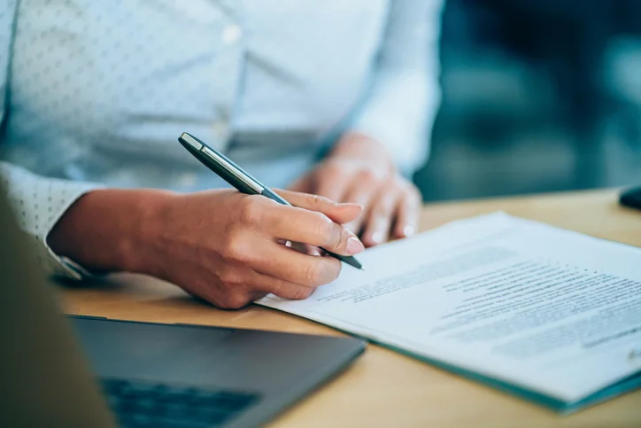 Woman working on estate planning documents