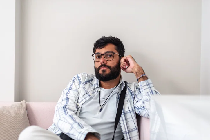 ADHD man sitting on the couch
